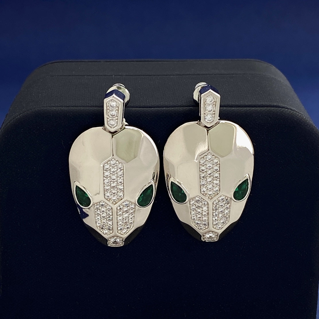 Bulga* snake head diamond earrings