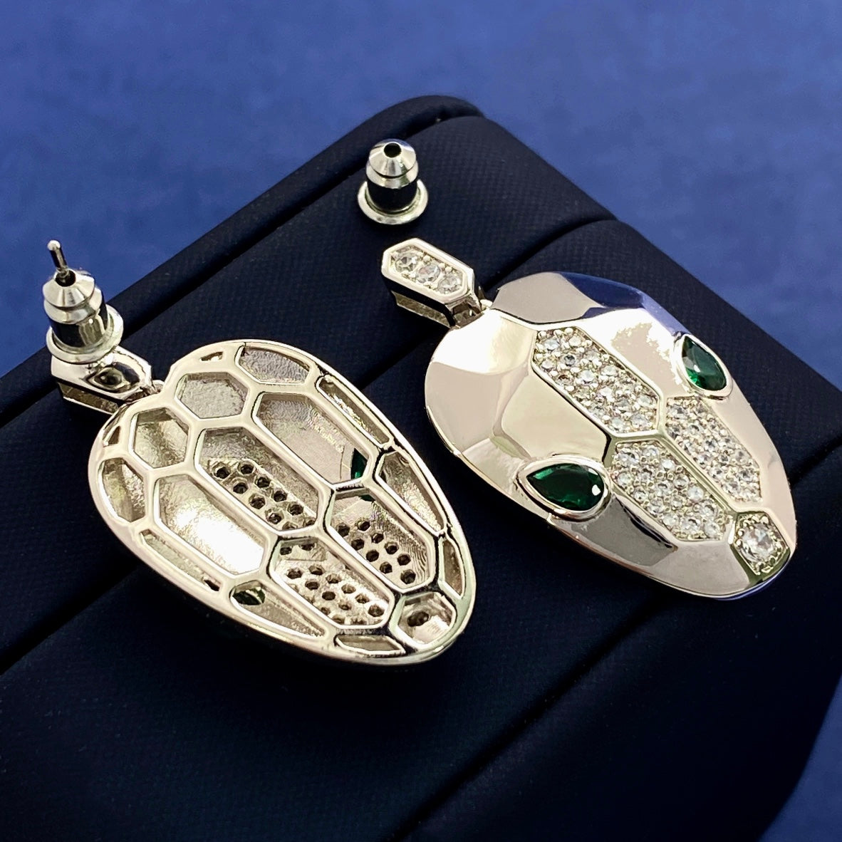 Bulga* snake head diamond earrings