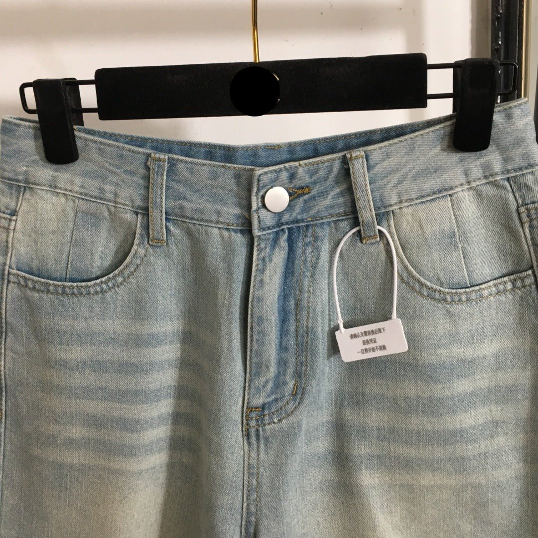 MM6 ripped denim shorts