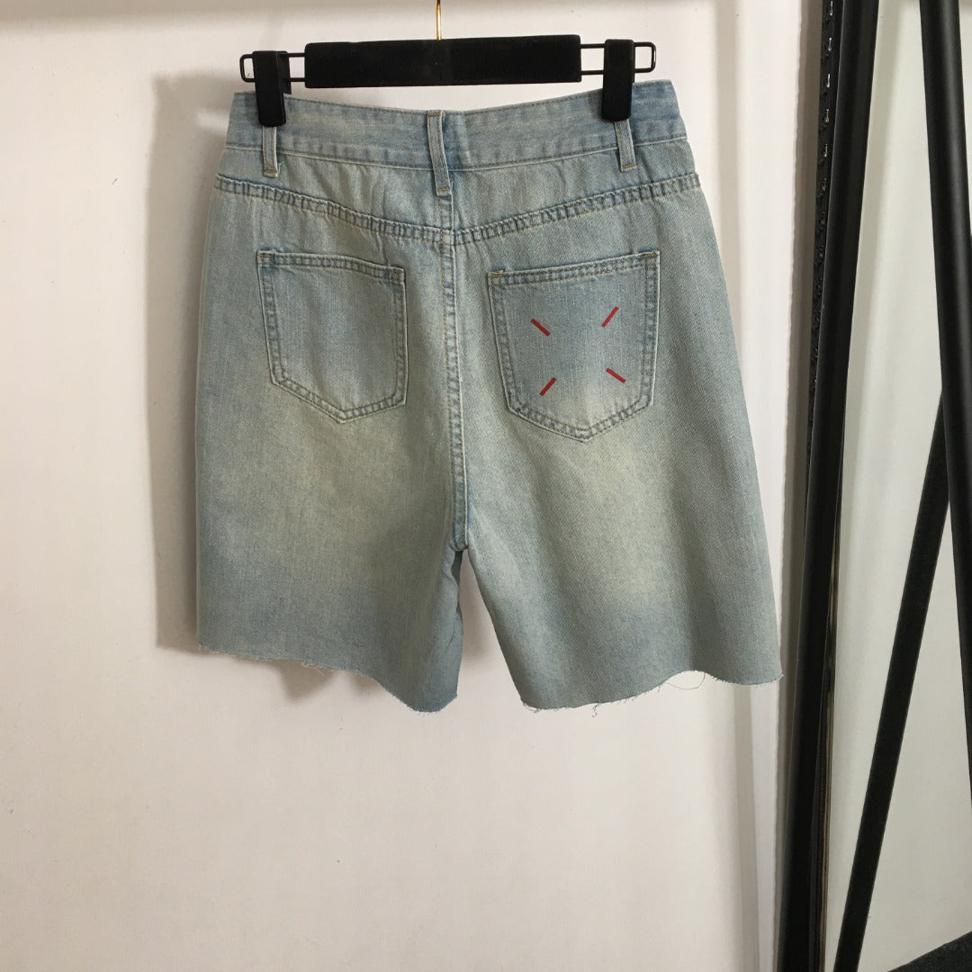 MM6 ripped denim shorts