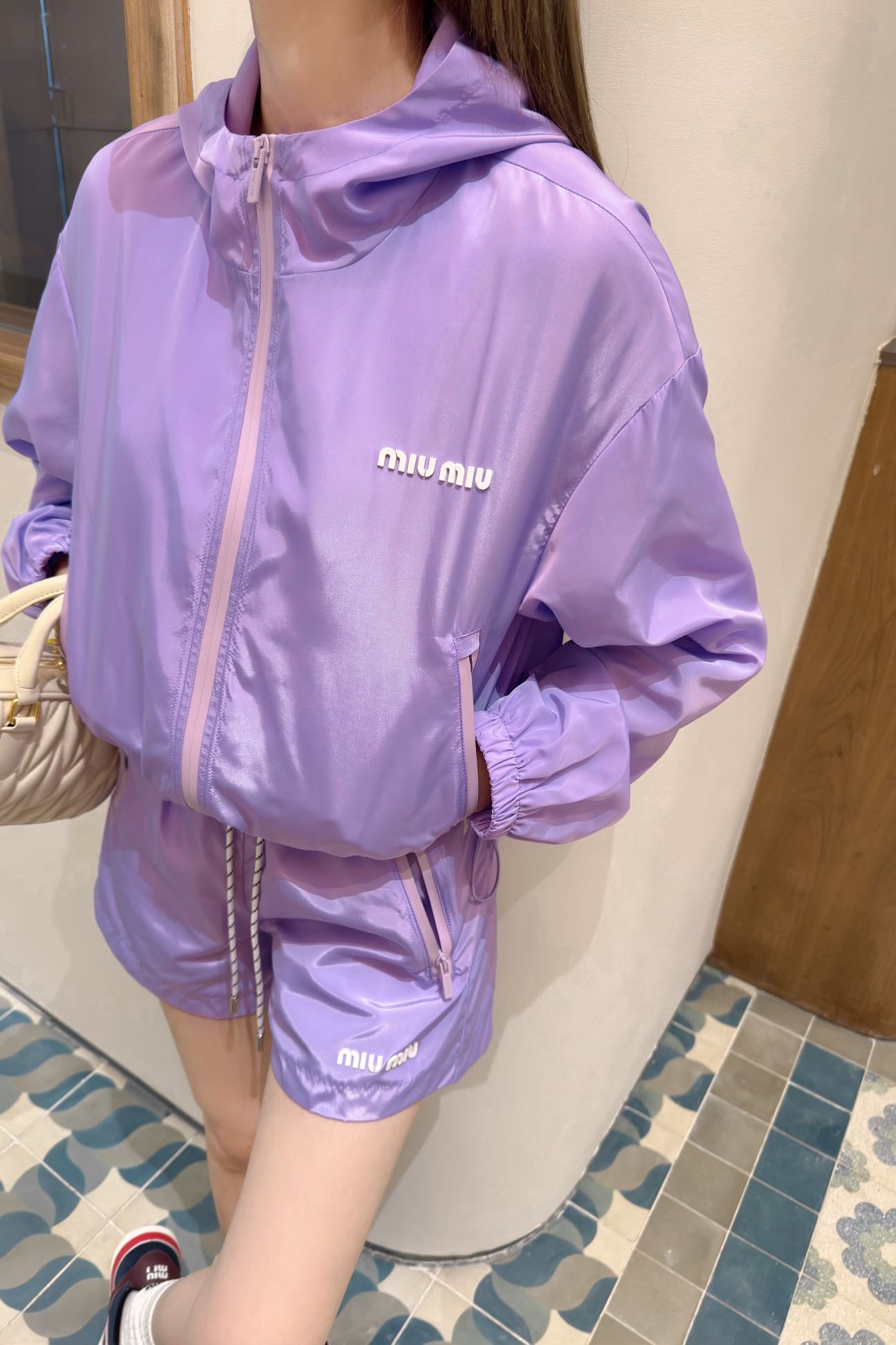 MIU* 25SS anti-hooded zip-up jacket + high-waisted shorts set
