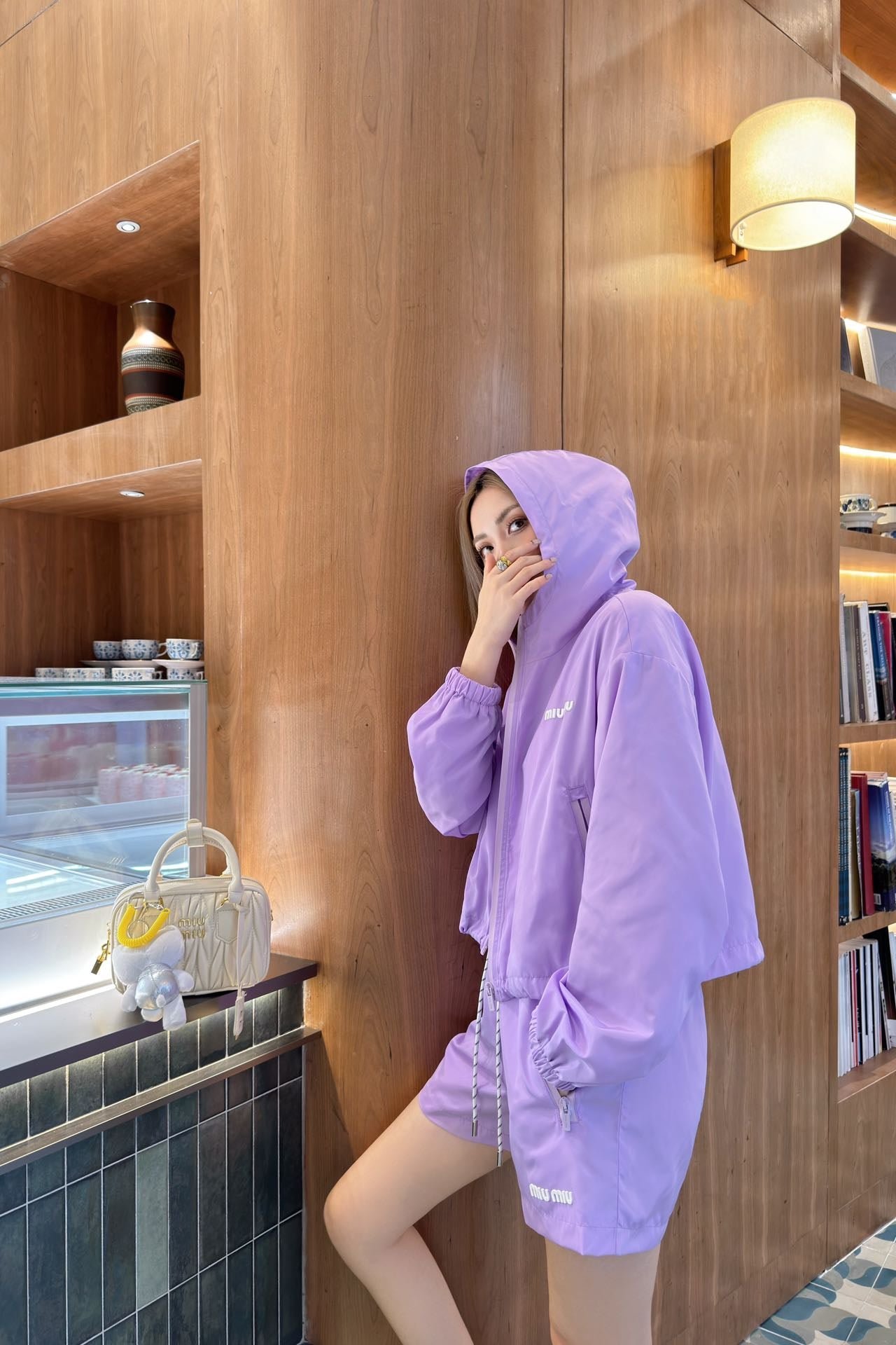 MIU* 25SS anti-hooded zip-up jacket + high-waisted shorts set