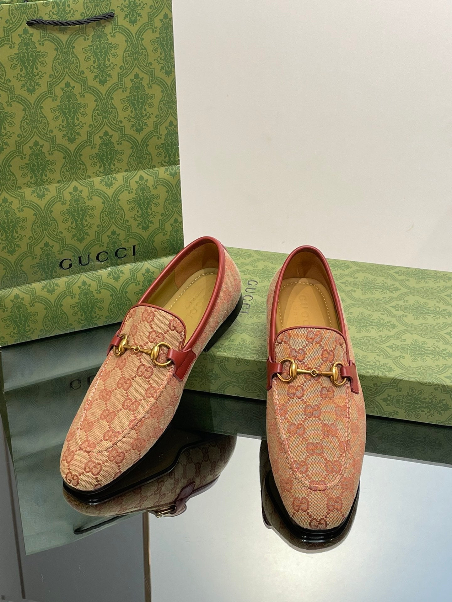 GG distressed black horsebit shoes