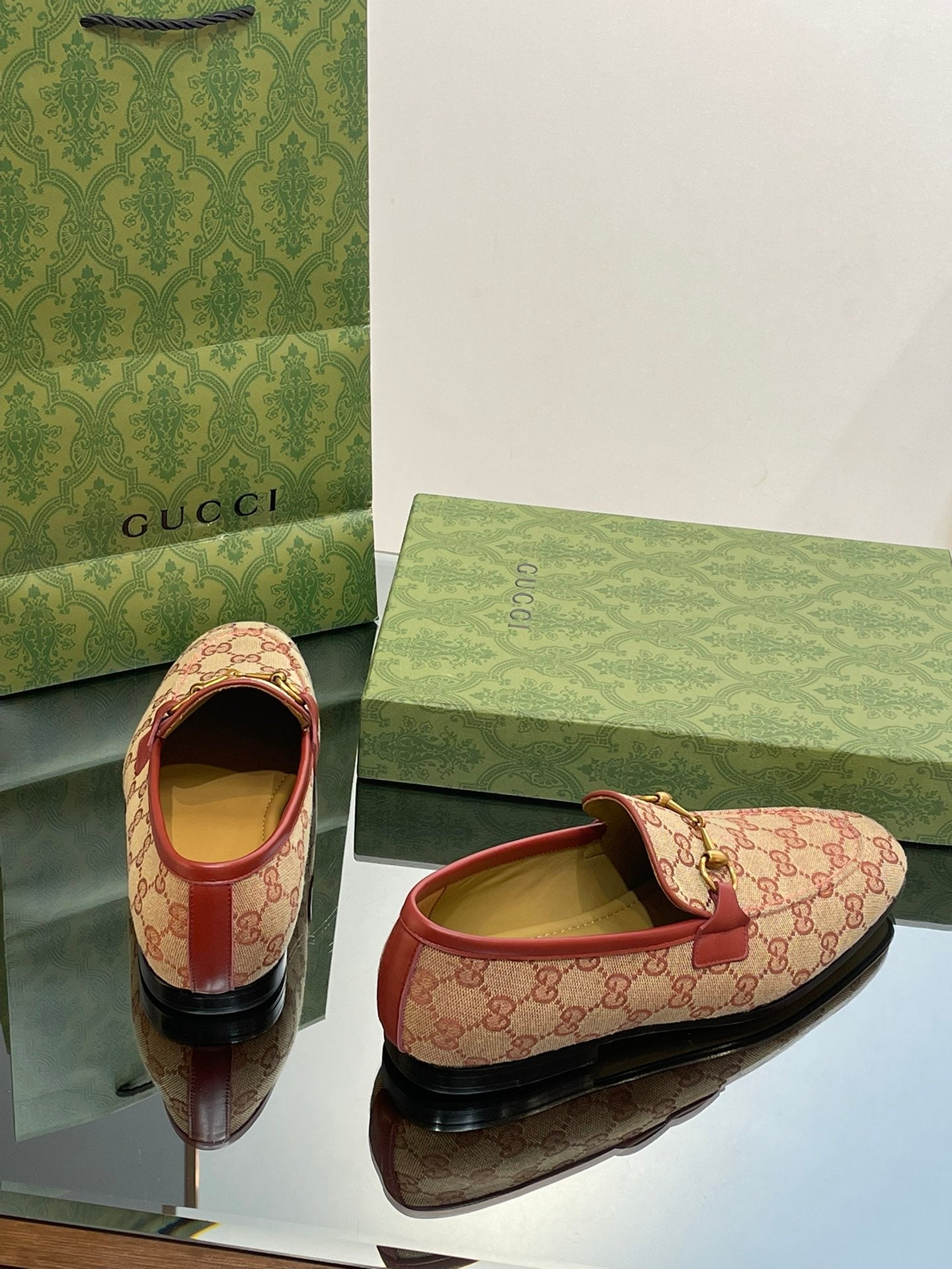 GG distressed black horsebit shoes