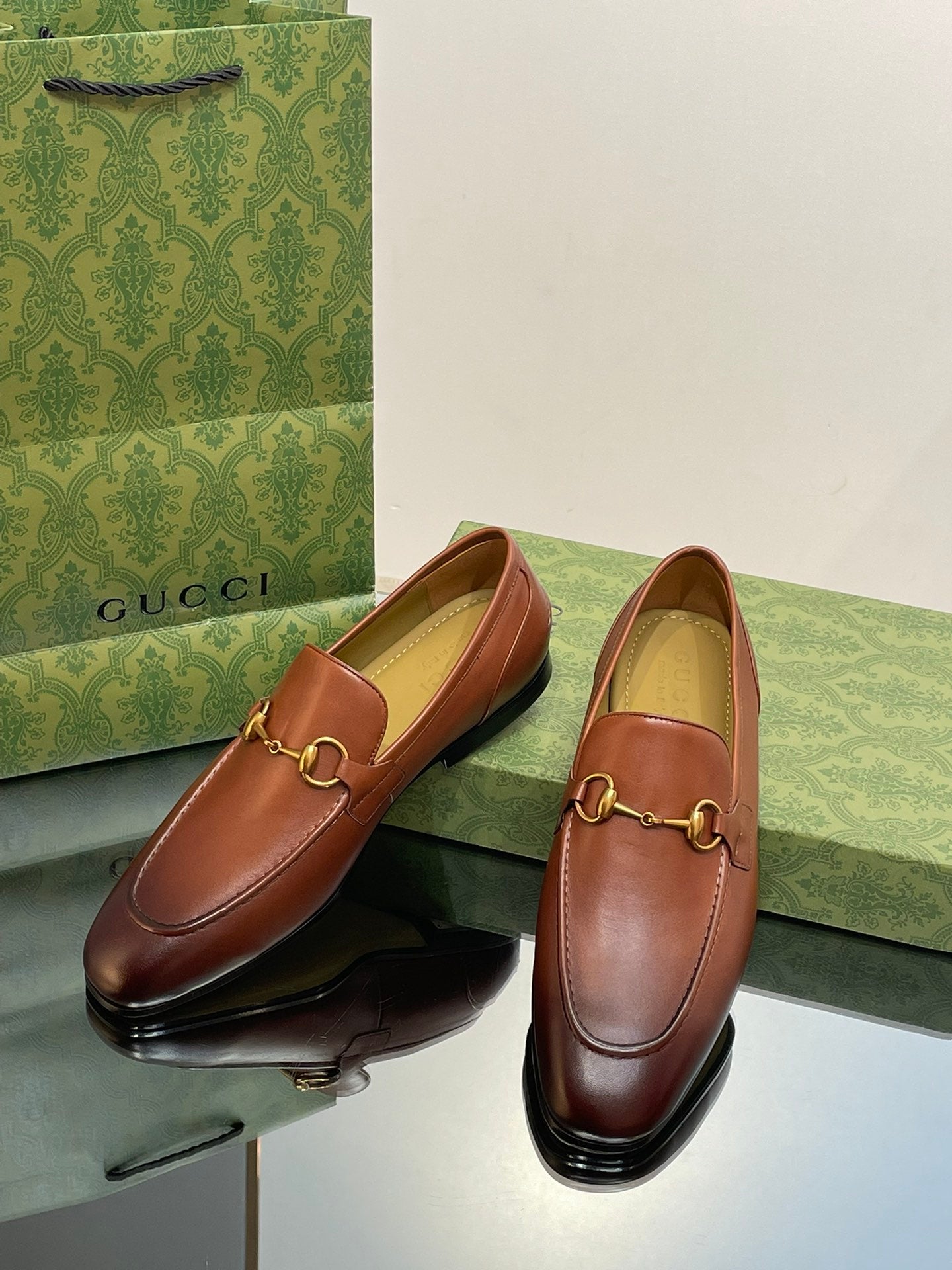 GG distressed black horsebit shoes