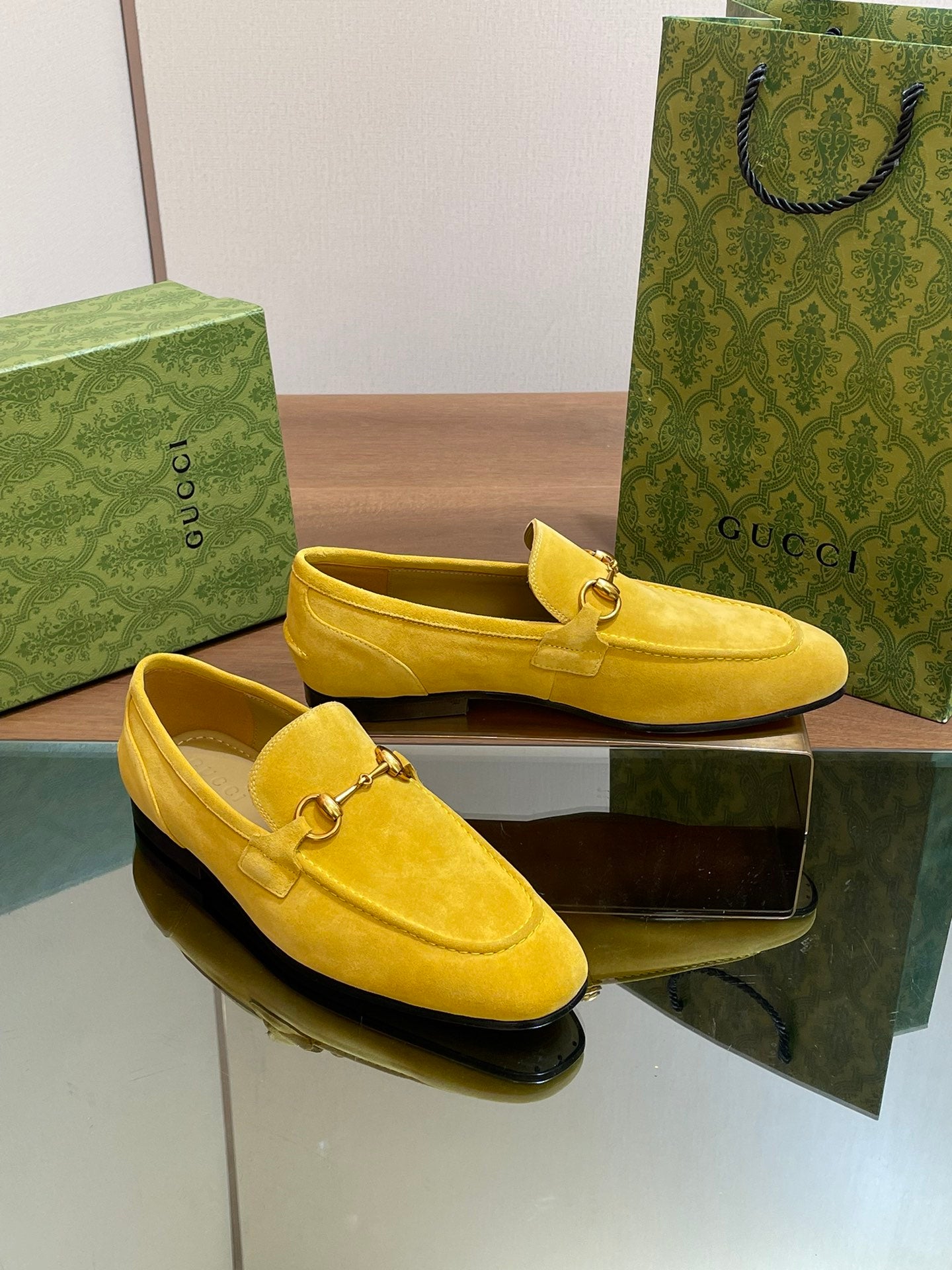 GG distressed black horsebit shoes