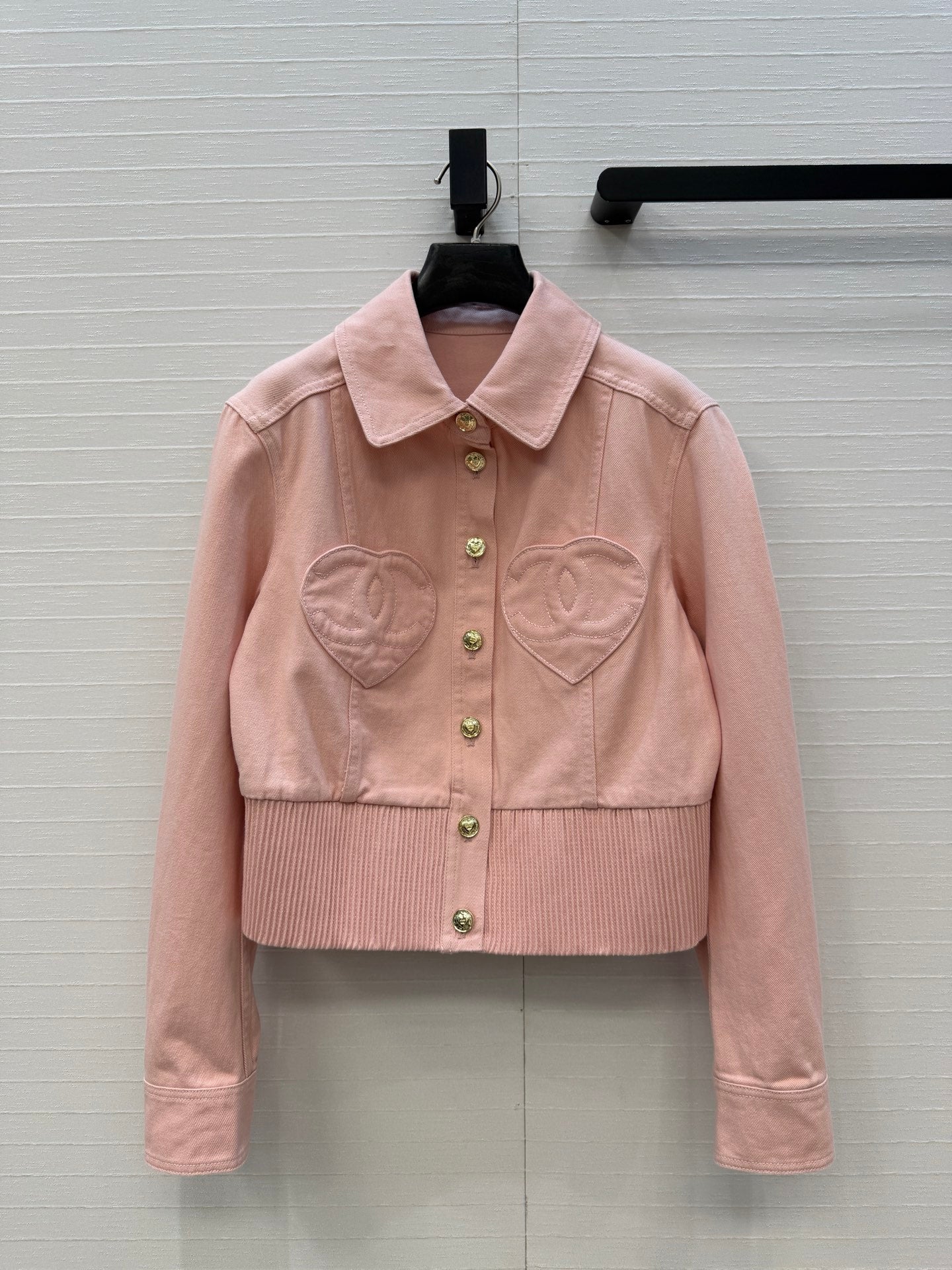 Chanel heart-patterned denim jacket / high-waisted jeans