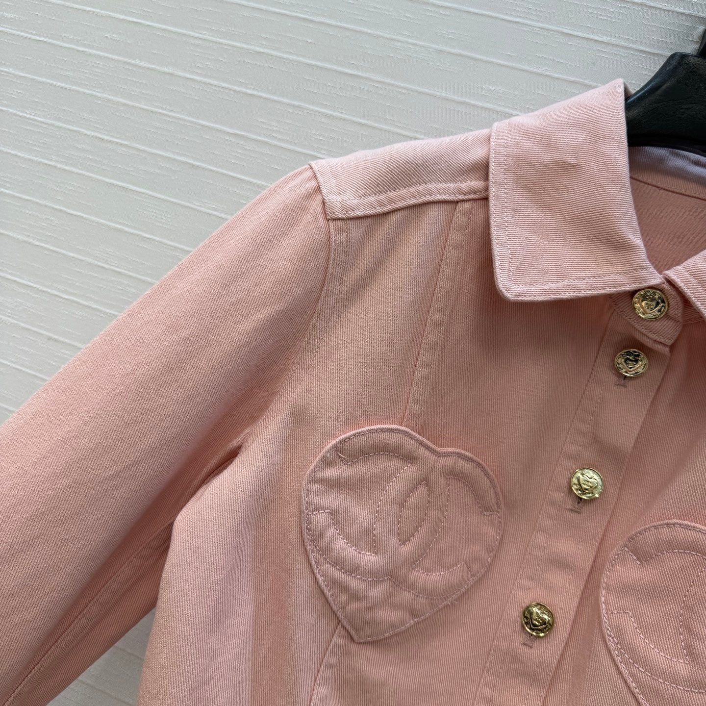 Chanel heart-patterned denim jacket / high-waisted jeans