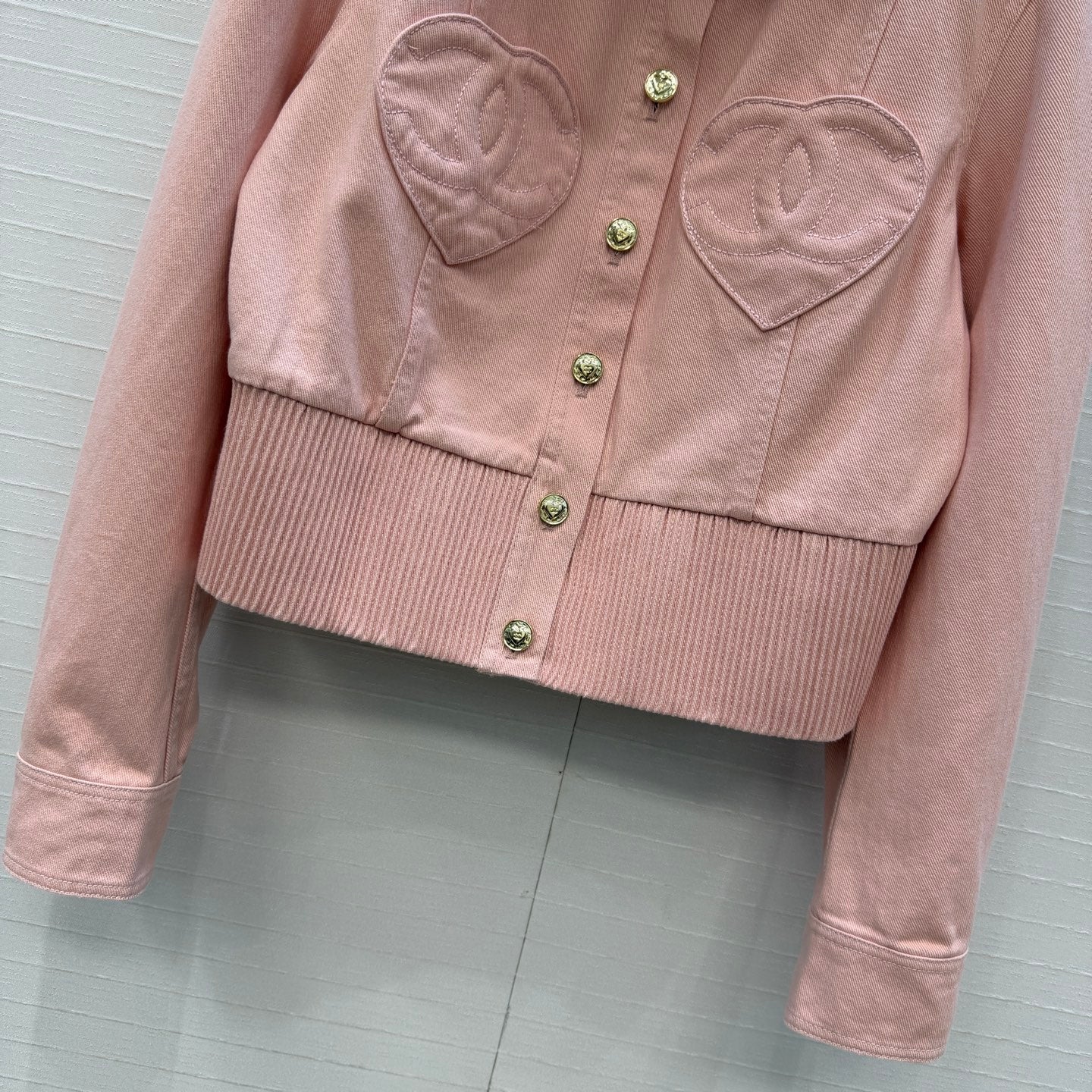 Chanel heart-patterned denim jacket / high-waisted jeans
