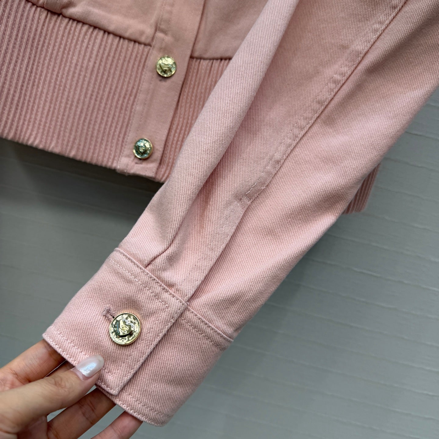 Chanel heart-patterned denim jacket / high-waisted jeans