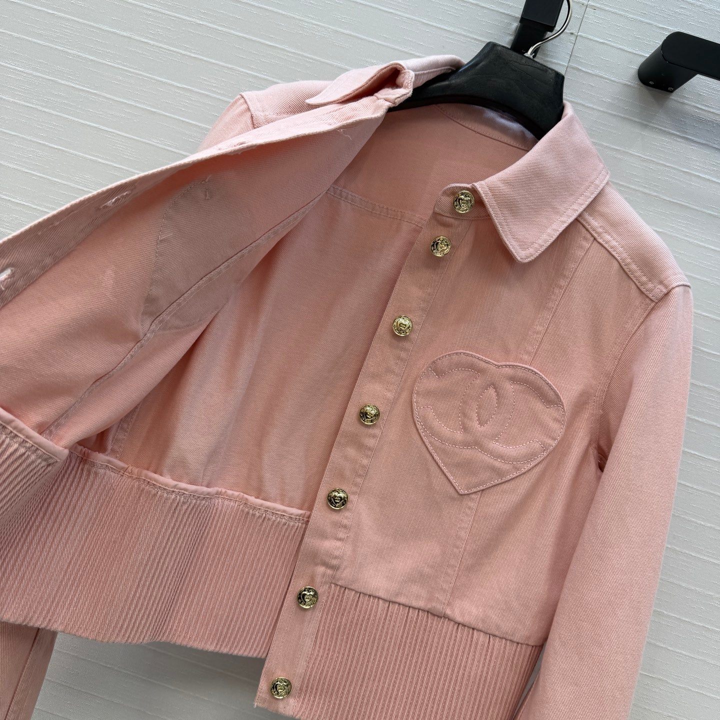 Chanel heart-patterned denim jacket / high-waisted jeans