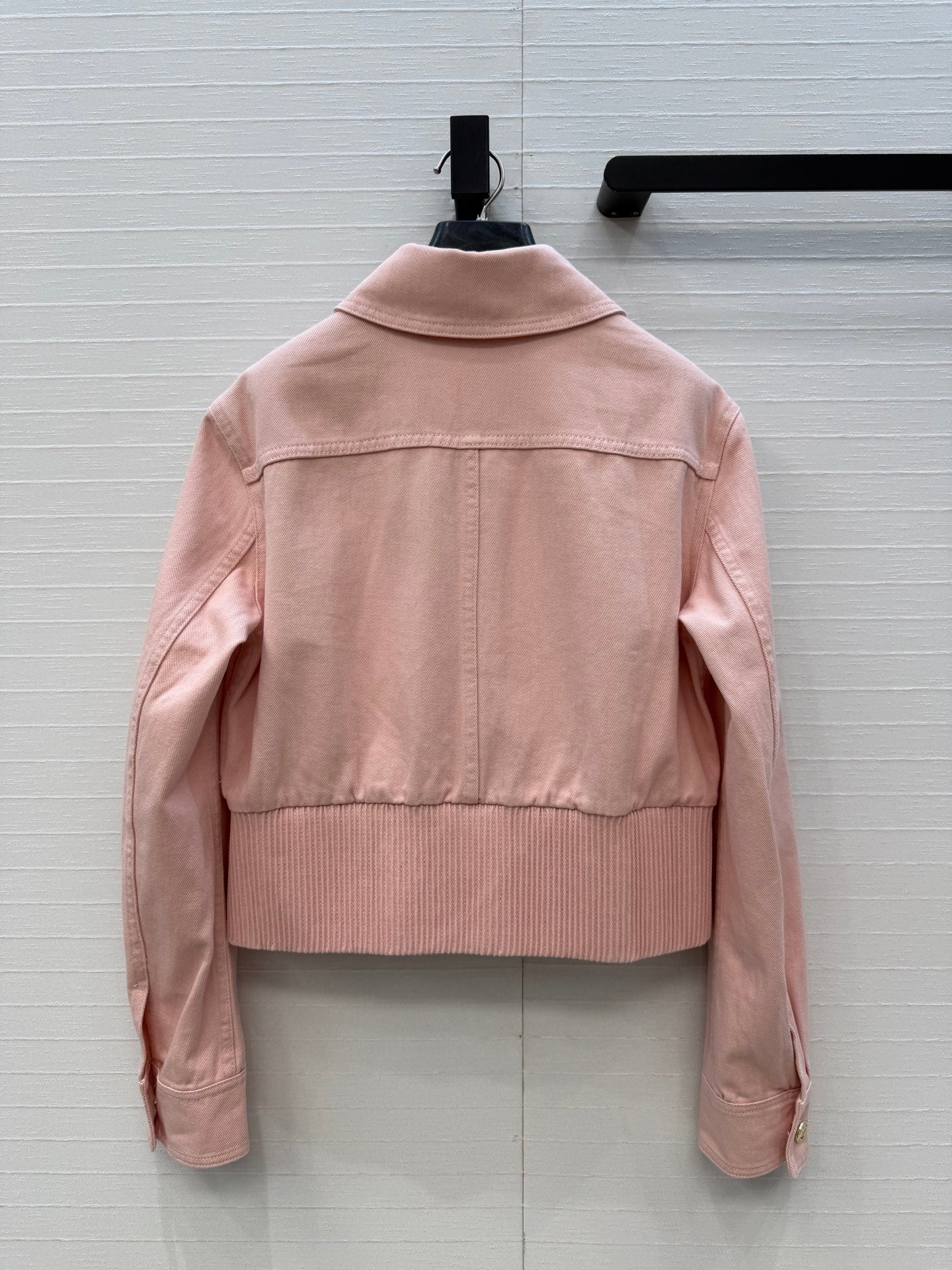 Chanel heart-patterned denim jacket / high-waisted jeans