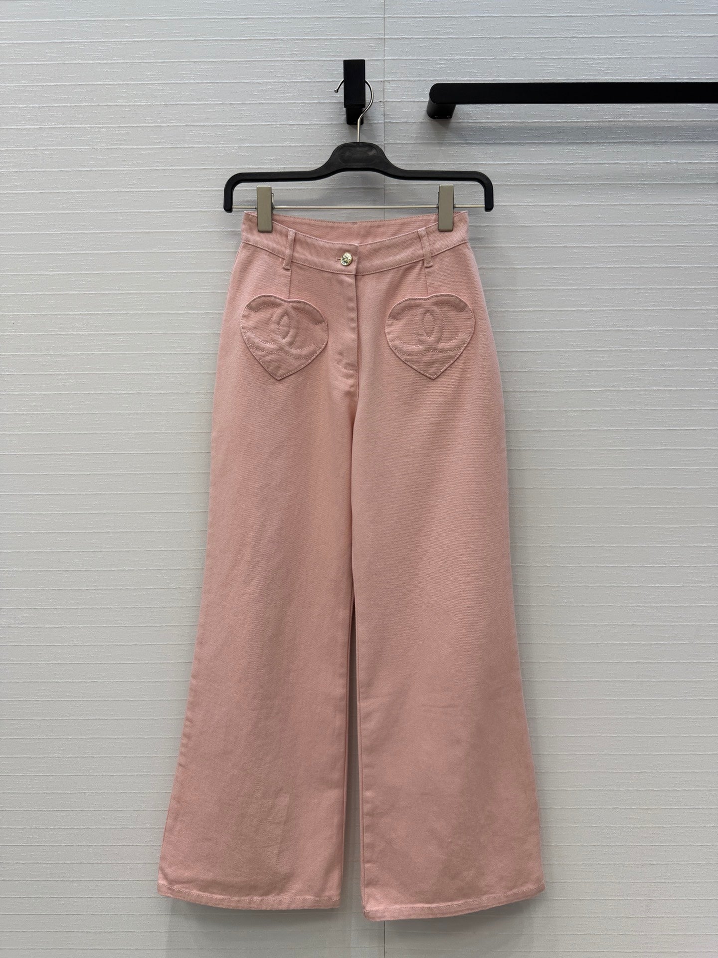 Chanel heart-patterned denim jacket / high-waisted jeans