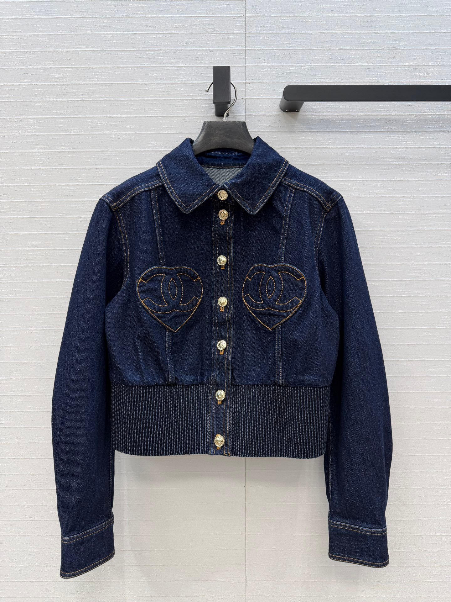 Chanel heart-patterned denim jacket / high-waisted jeans