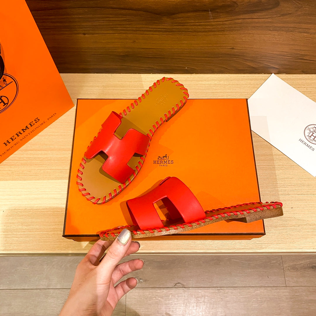 New H new woven slippers