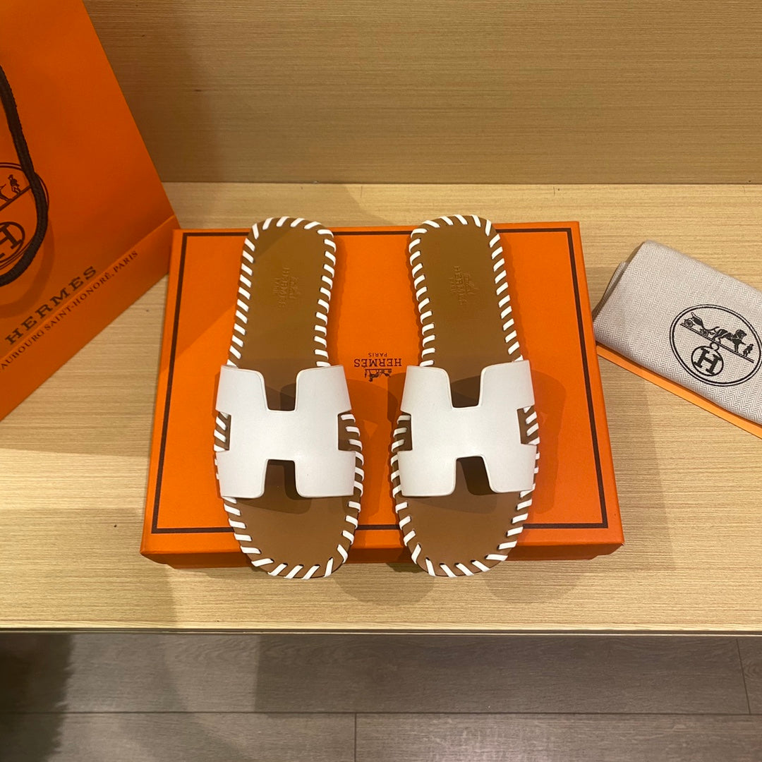 New H new woven slippers