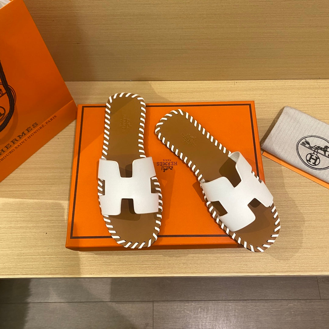 New H new woven slippers