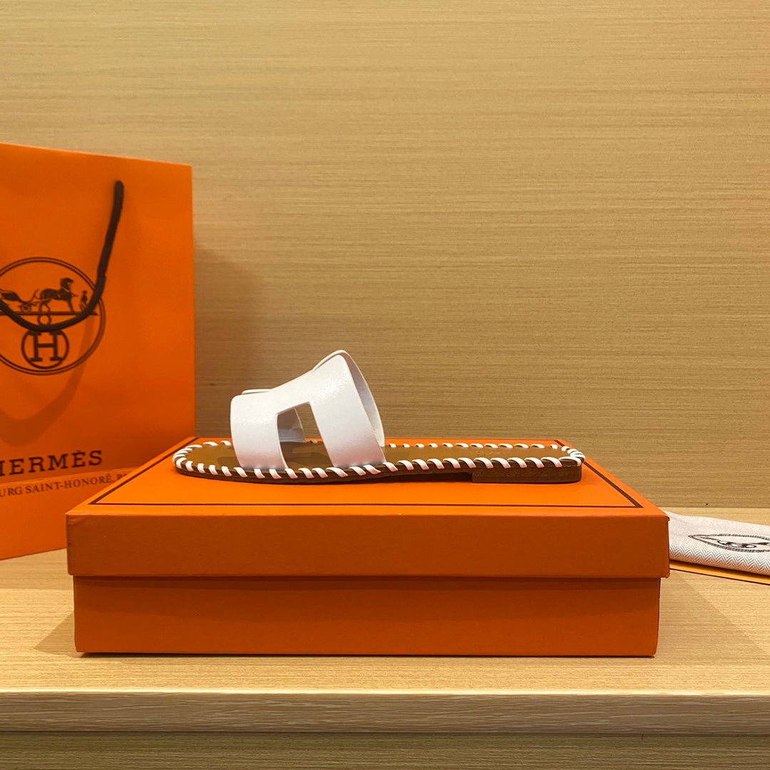 New H new woven slippers