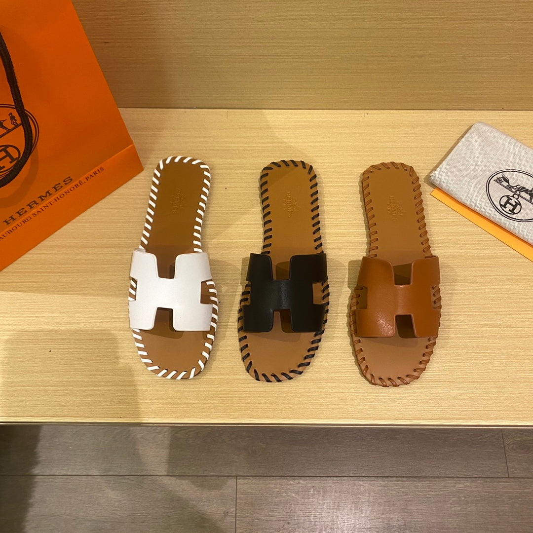 New H new woven slippers