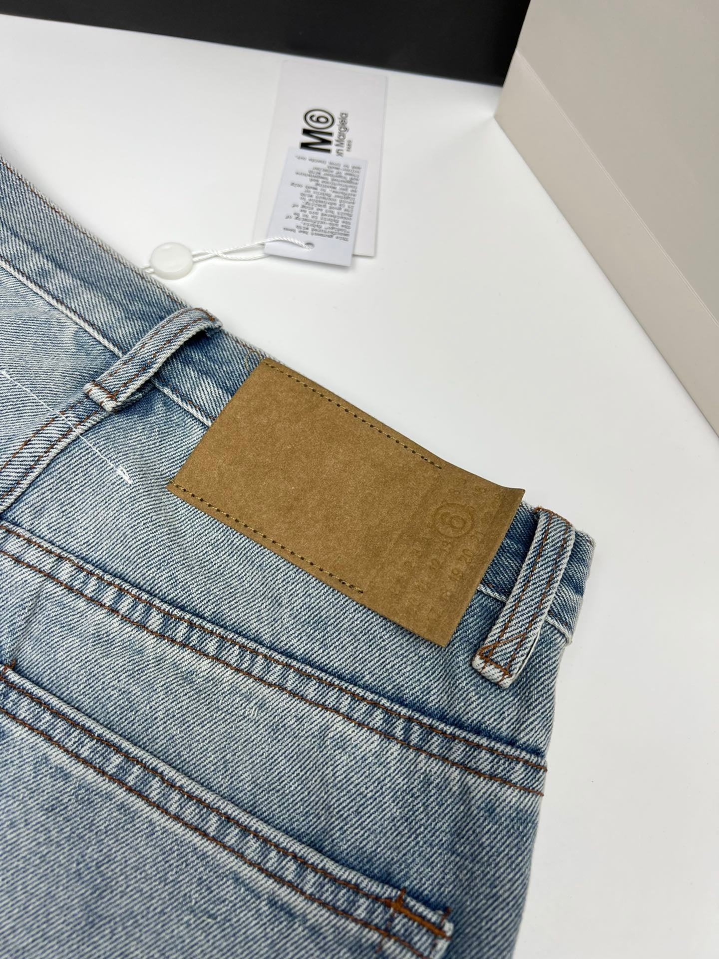 Mm6 ripped asymmetric straight pants