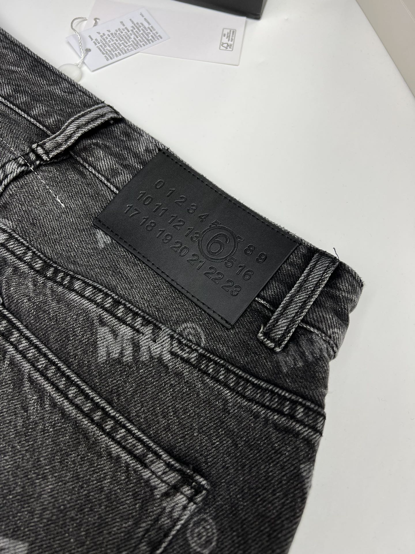 MM6 front and back gradient full print trousers