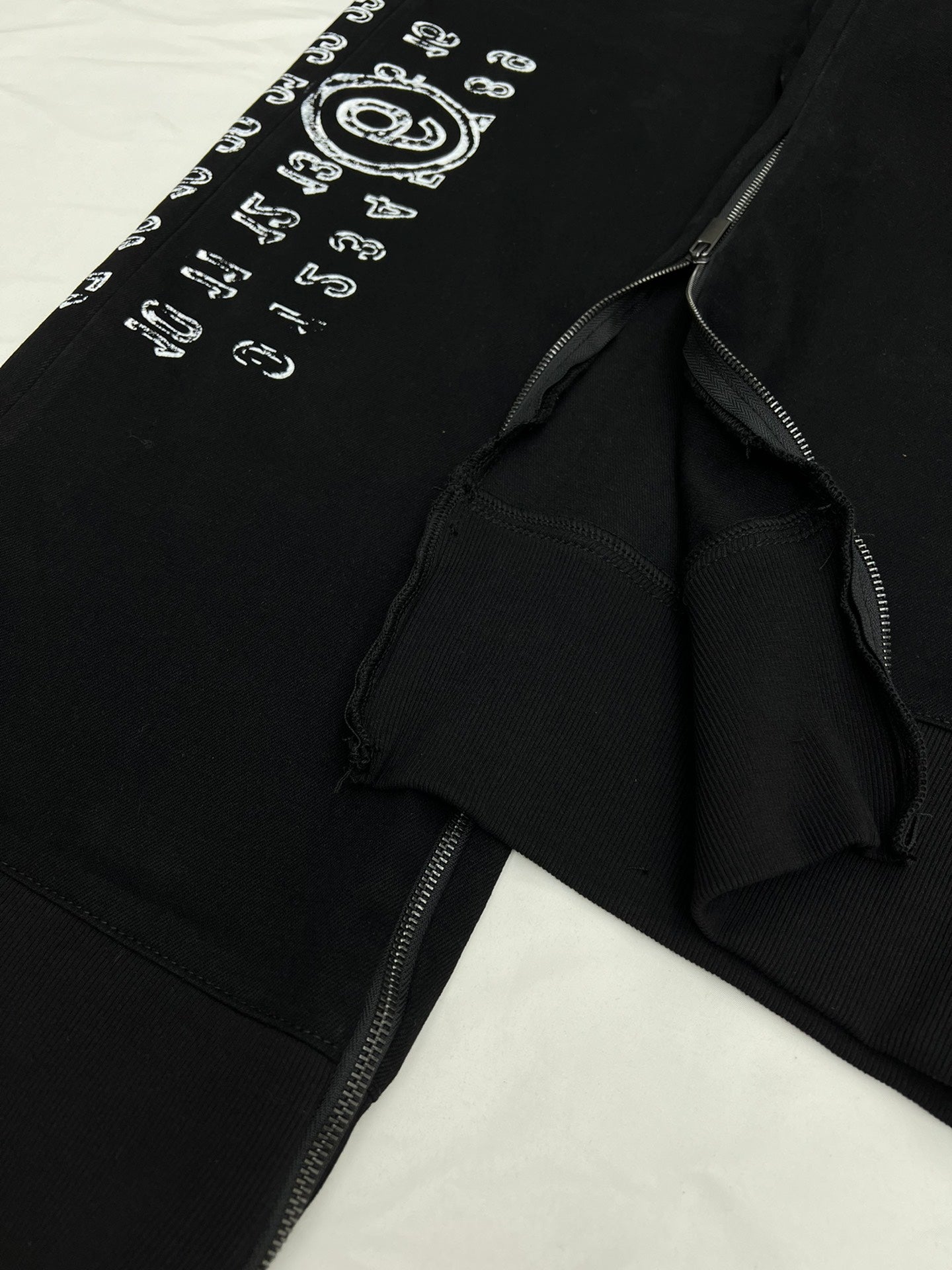 MM6 side printed letter patchwork trousers