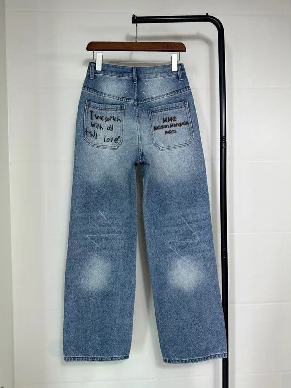 MM6 Margiela ripped back pocket embroidered trousers