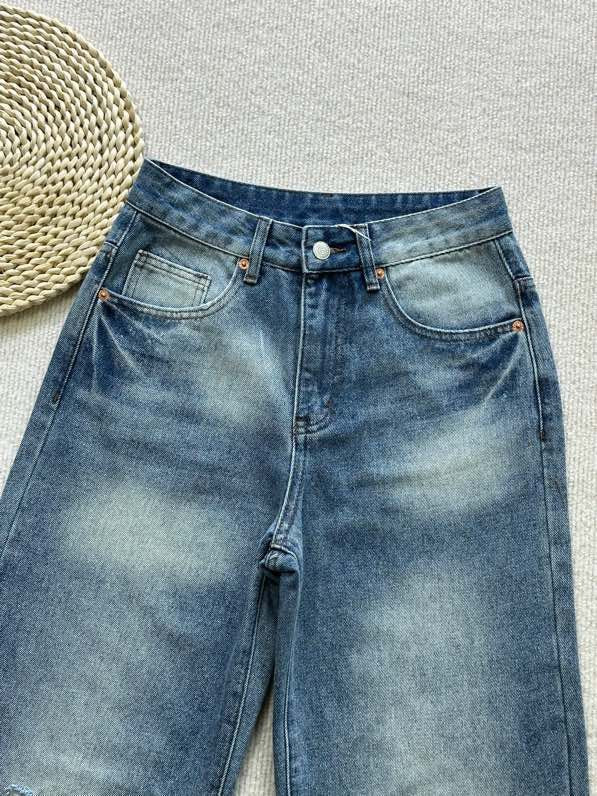 MM6 Margiela ripped back pocket embroidered trousers