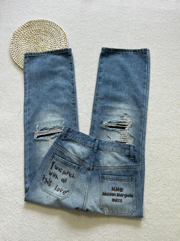 MM6 Margiela ripped back pocket embroidered trousers