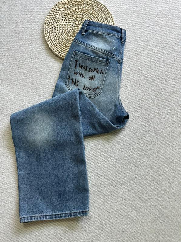 MM6 Margiela ripped back pocket embroidered trousers