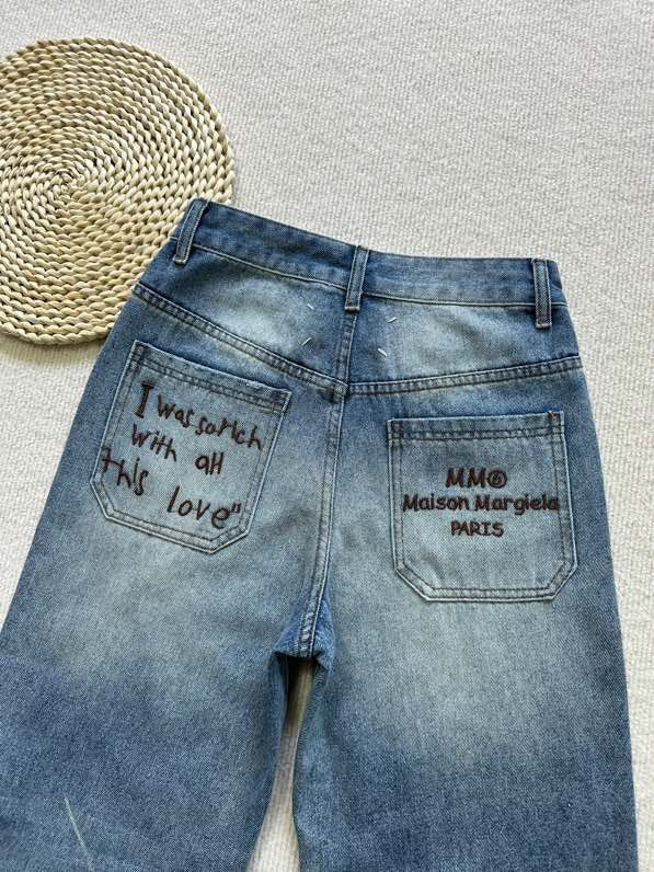 MM6 Margiela ripped back pocket embroidered trousers