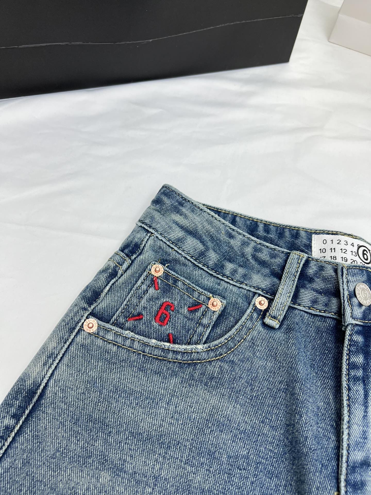 Margiela back pocket red embroidered number shorts