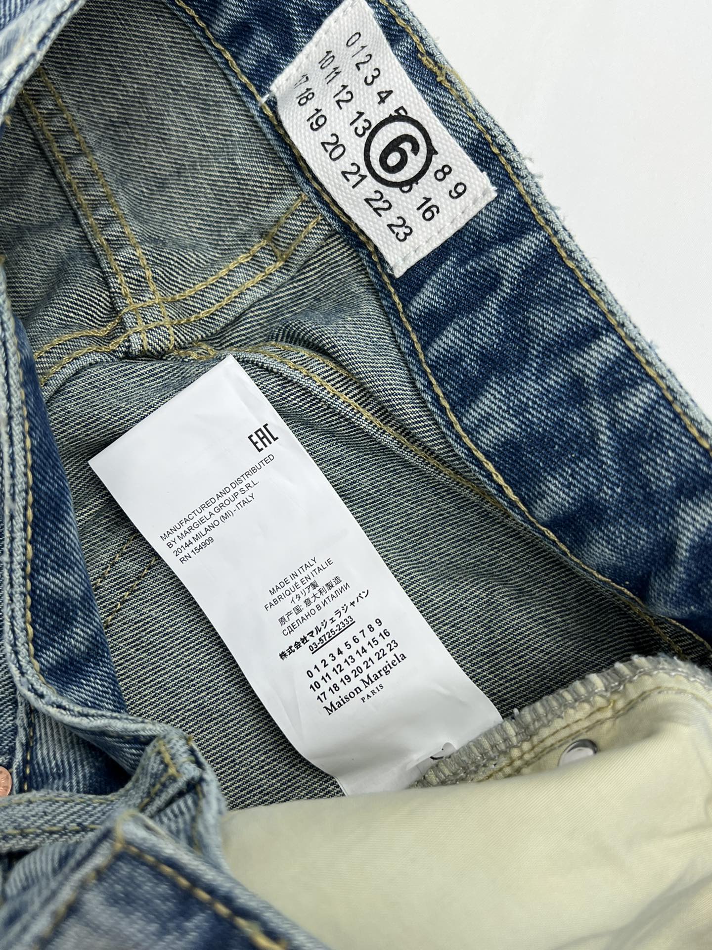 Margiela back pocket red embroidered number shorts