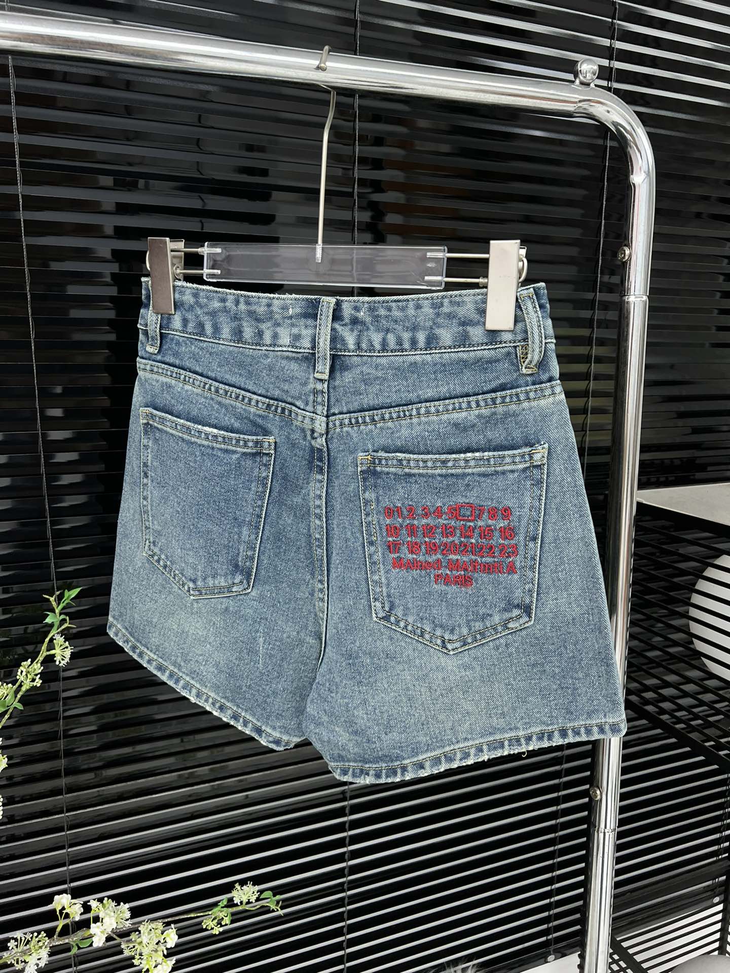 Margiela back pocket red embroidered number shorts