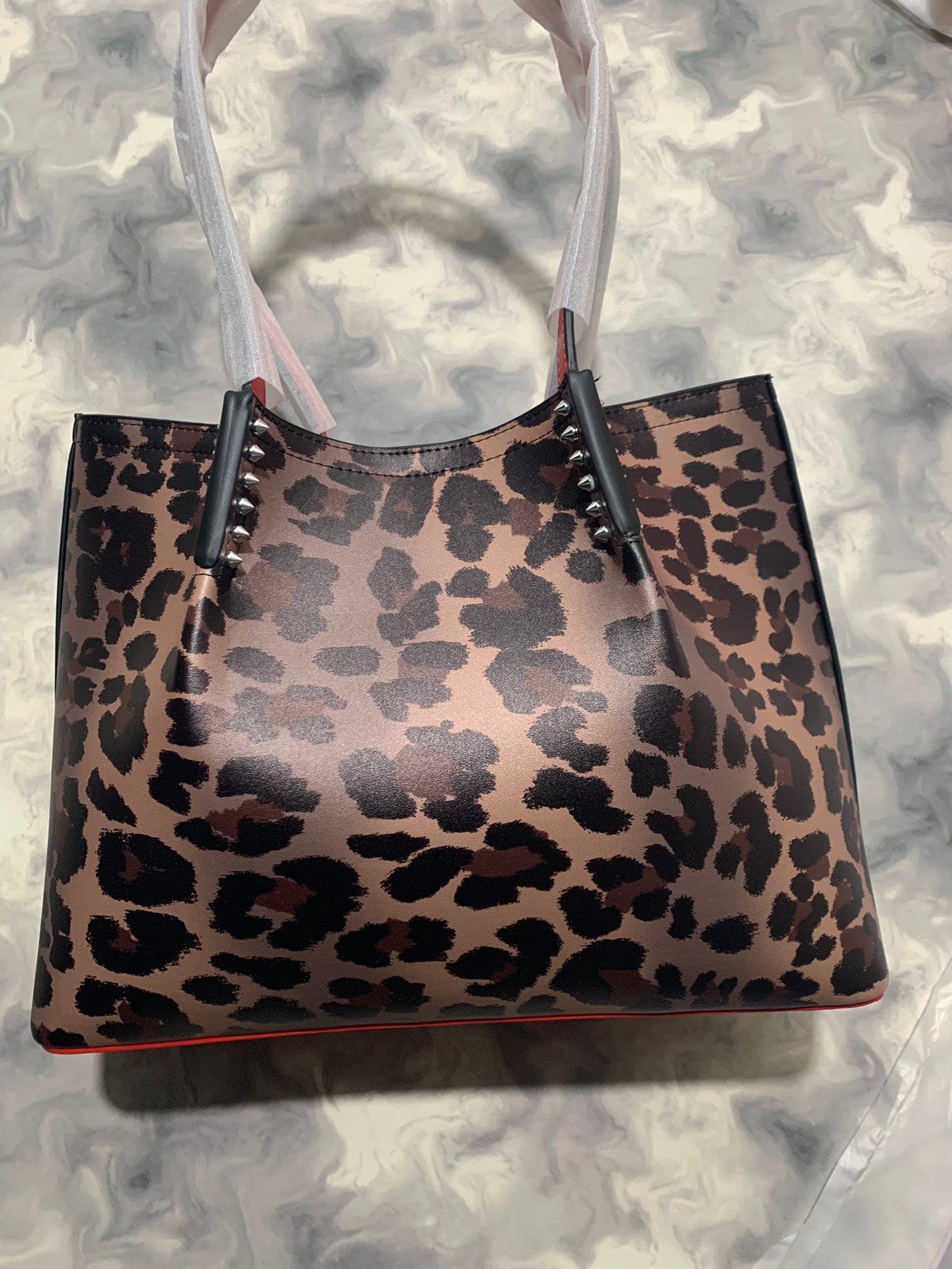 Christi** Loubout** Leopard print handbag