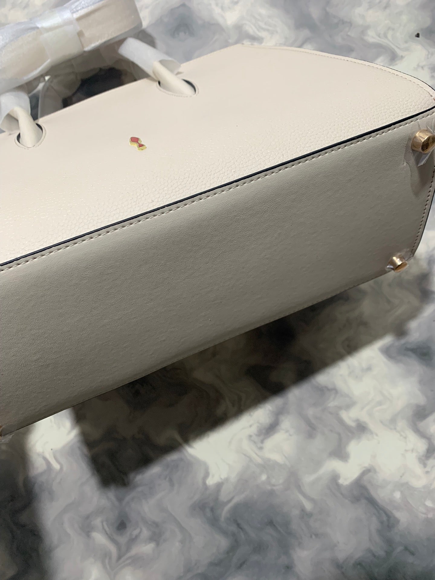 Christi** Loubout** red handbag