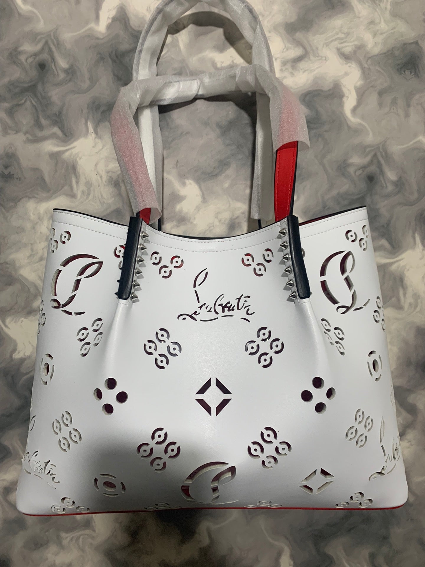 Christi** Loubout** hollow handbag