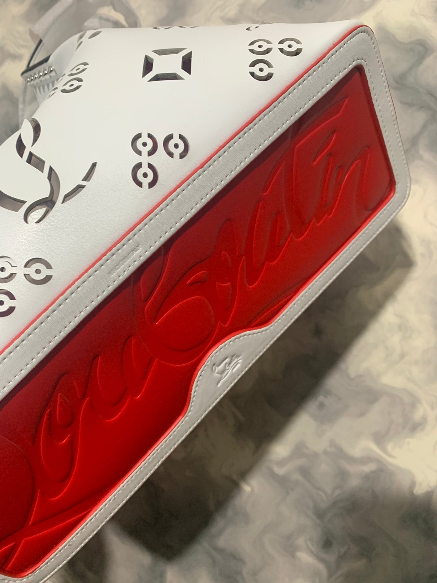 Christi** Loubout** hollow handbag