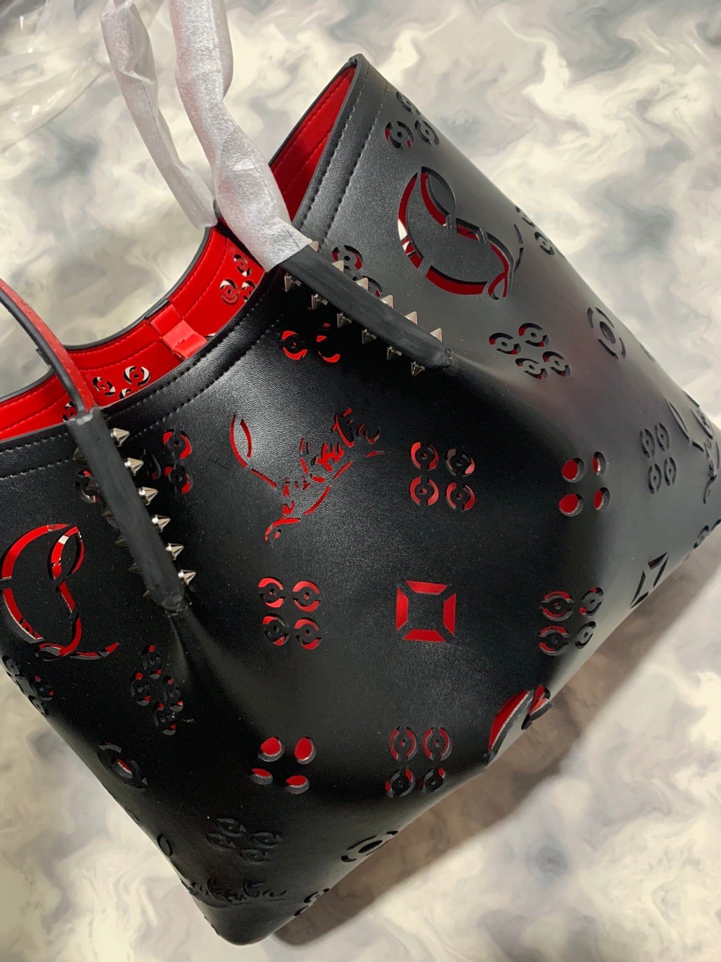 Christi** Loubout** hollow handbag