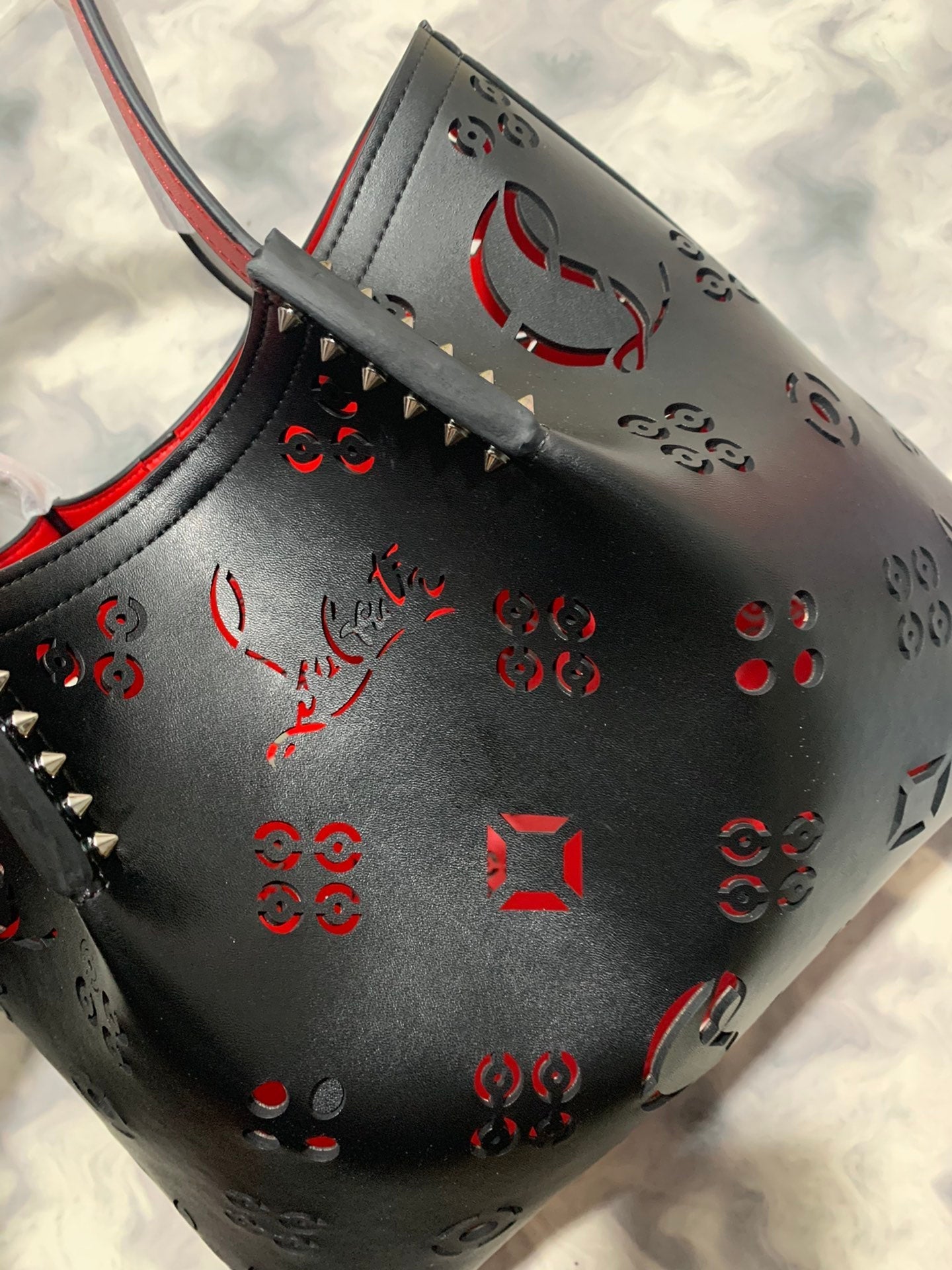 Christi** Loubout** hollow handbag