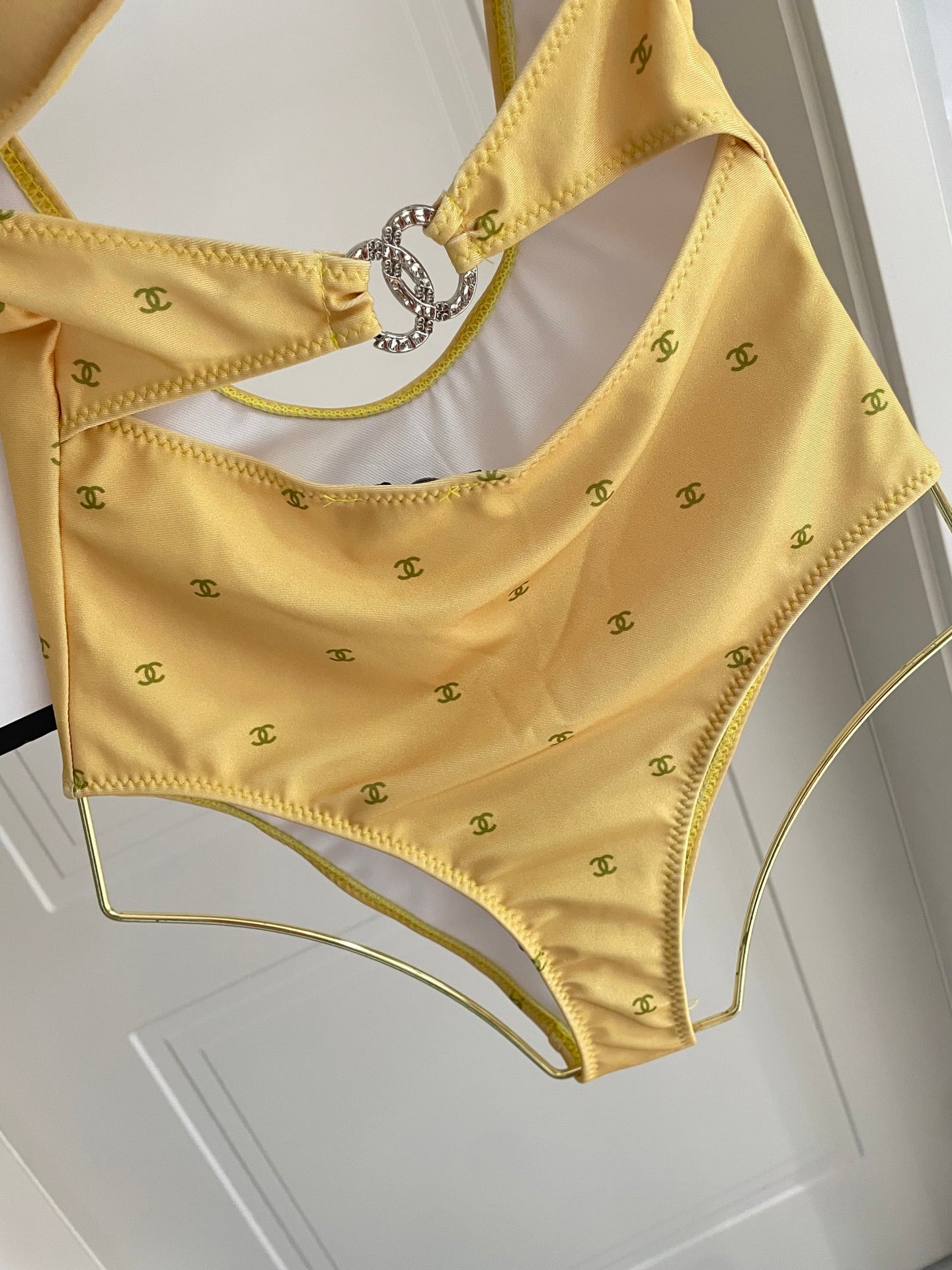 Figure-flattering, height-enhancing one-piece swimsuit