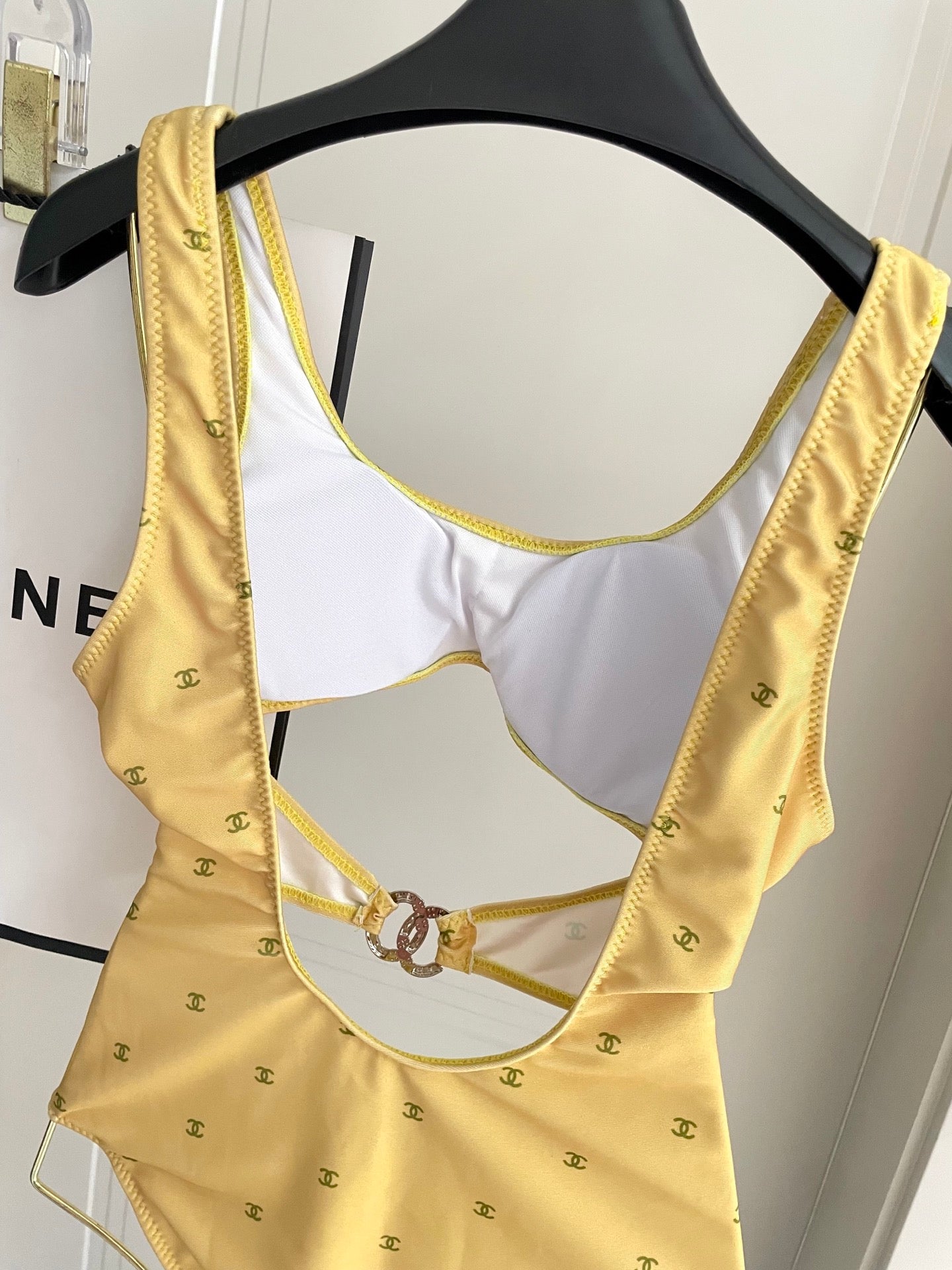 Figure-flattering, height-enhancing one-piece swimsuit