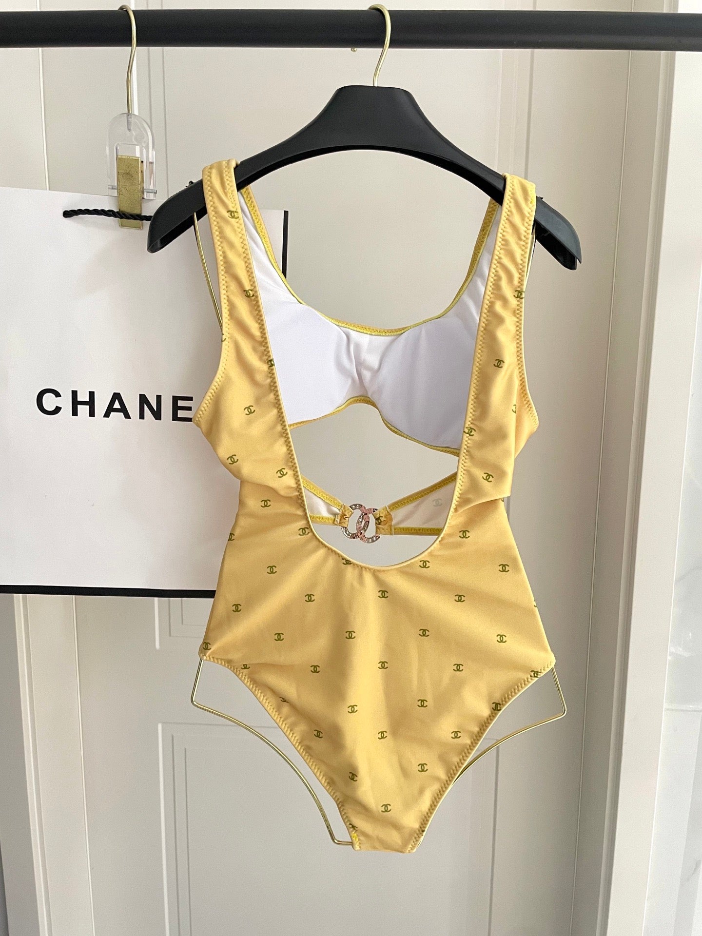 Figure-flattering, height-enhancing one-piece swimsuit