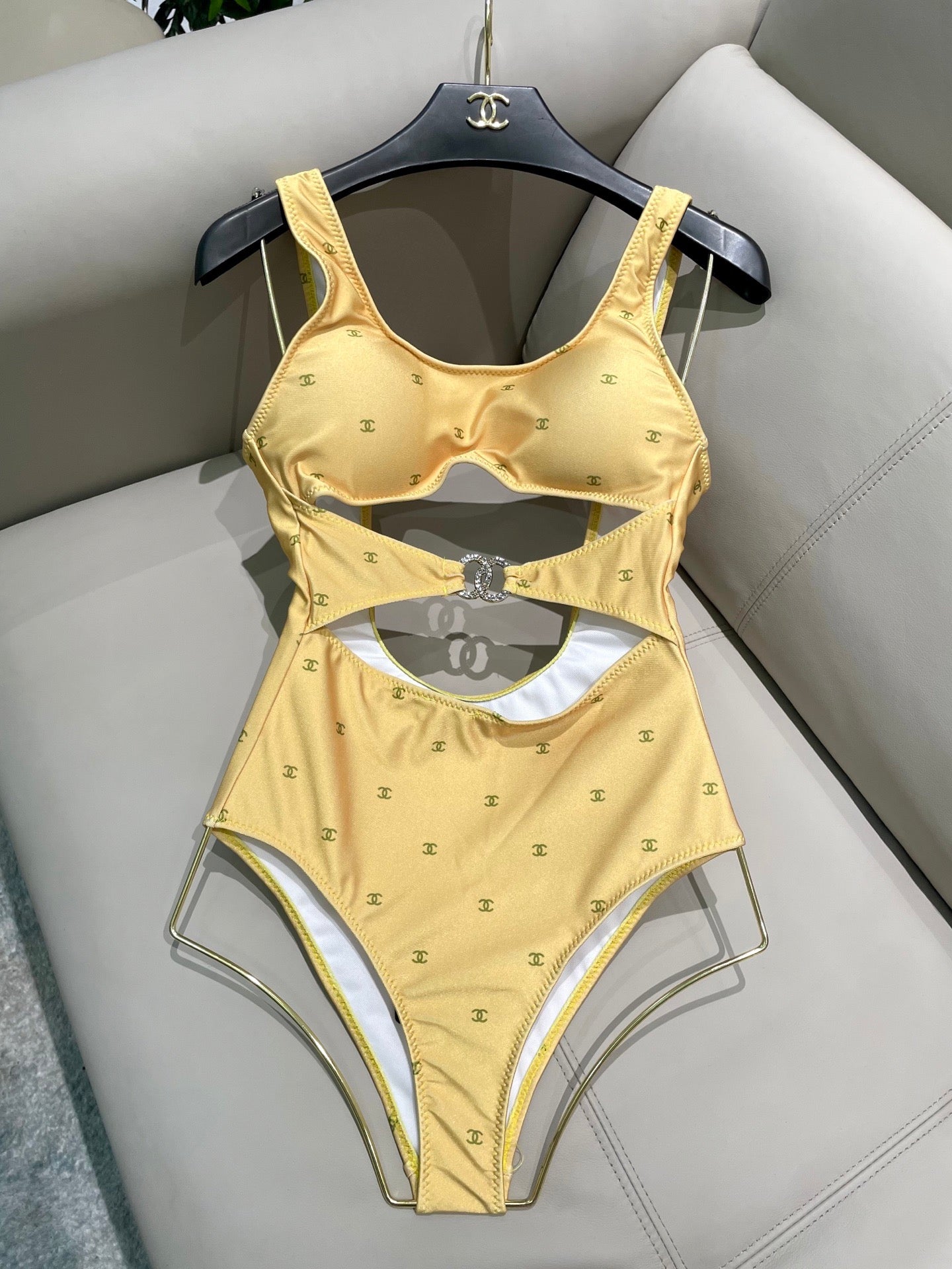Figure-flattering, height-enhancing one-piece swimsuit