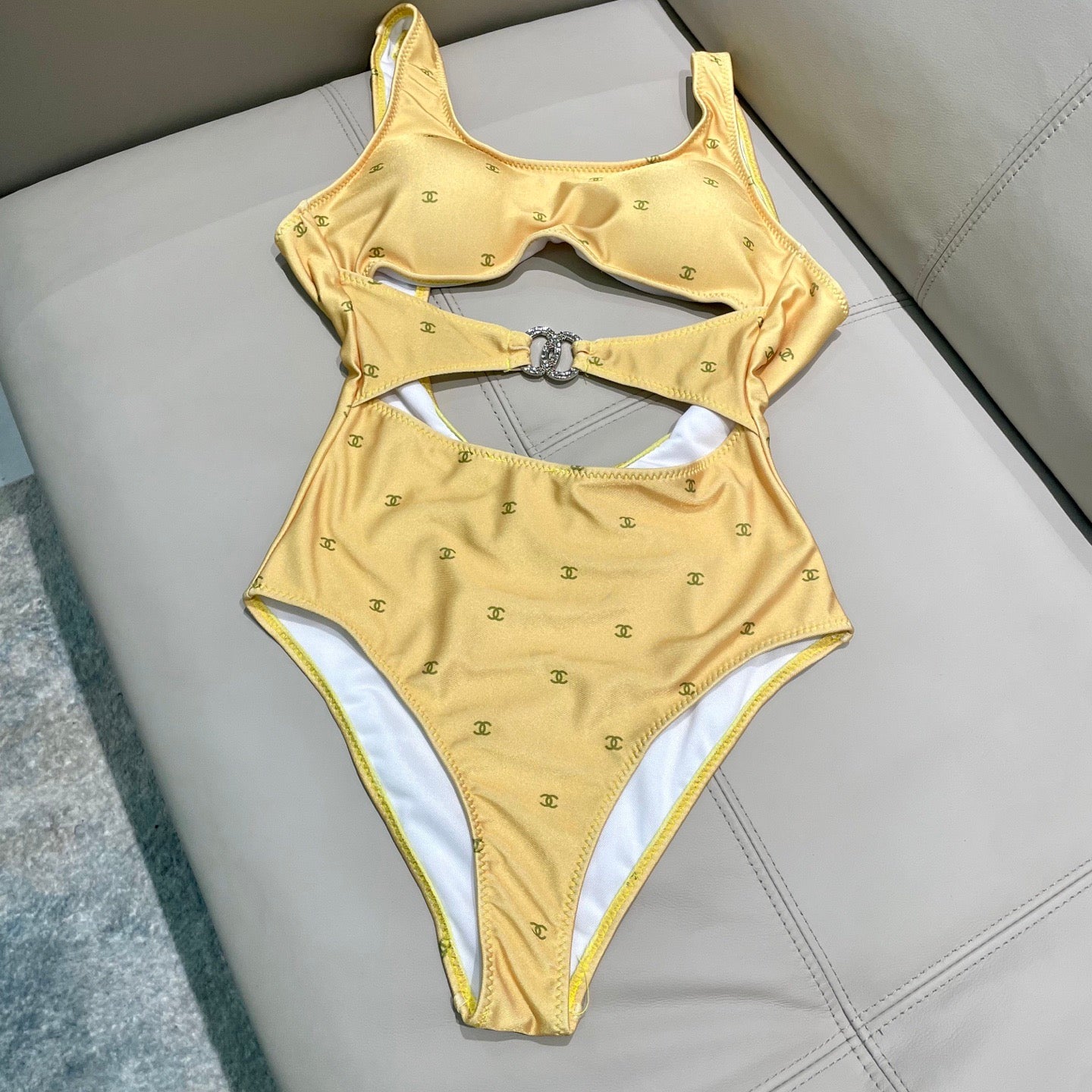 Figure-flattering, height-enhancing one-piece swimsuit