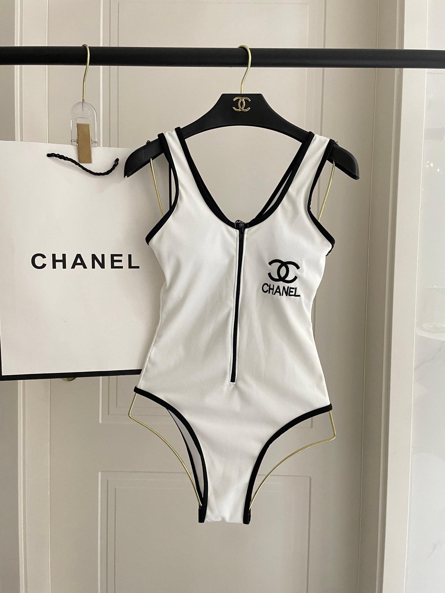 One-piece swimsuit with built-in bra pads.