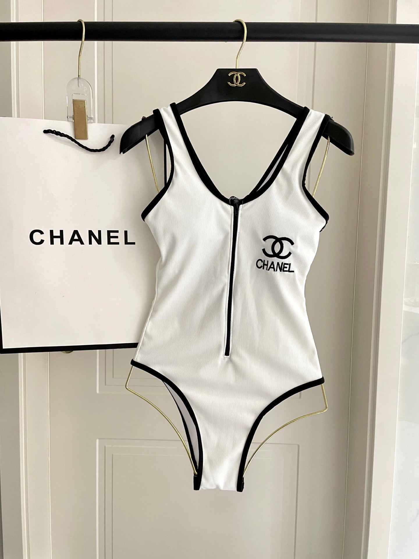 One-piece swimsuit with built-in bra pads.