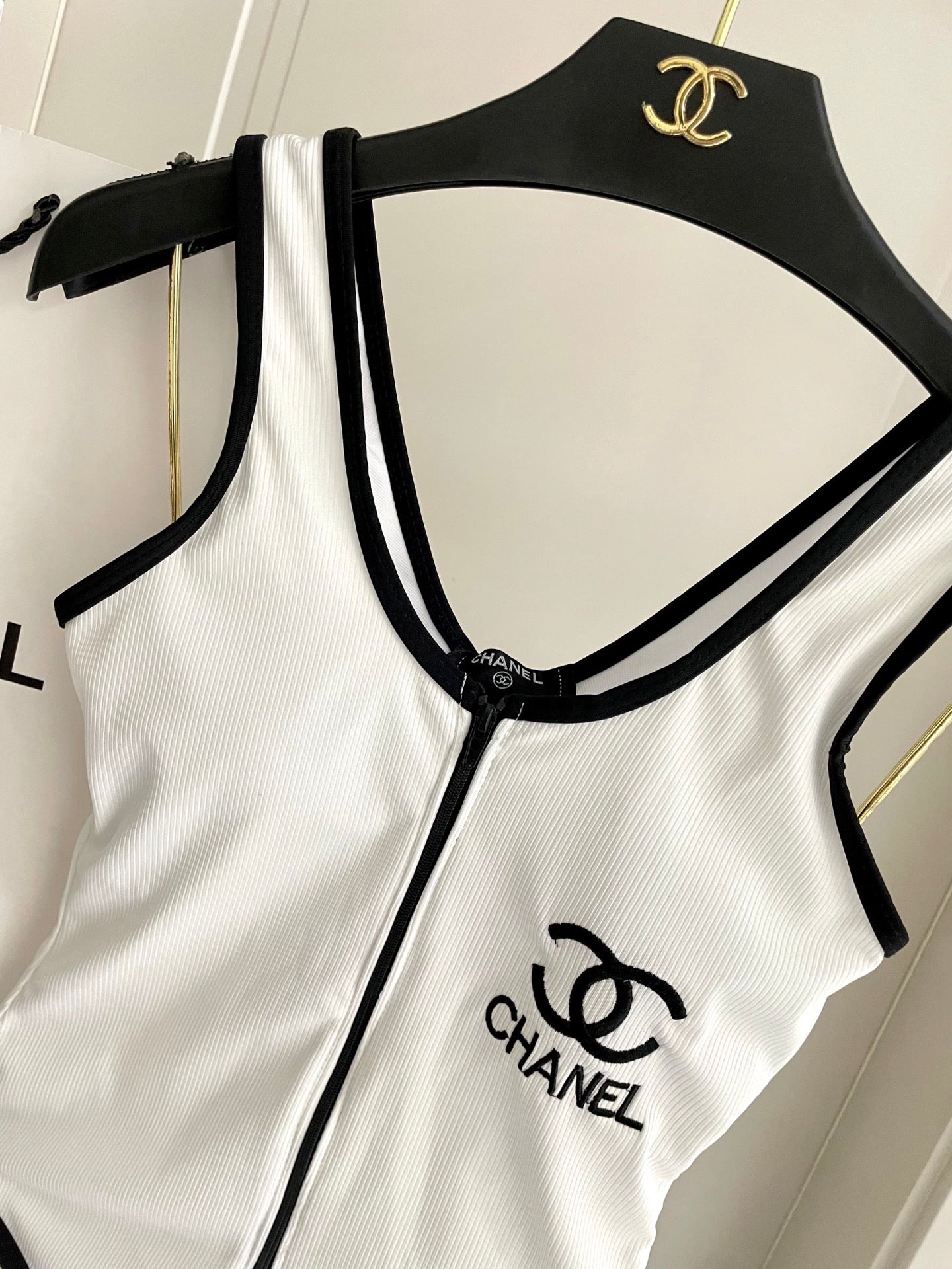 One-piece swimsuit with built-in bra pads.