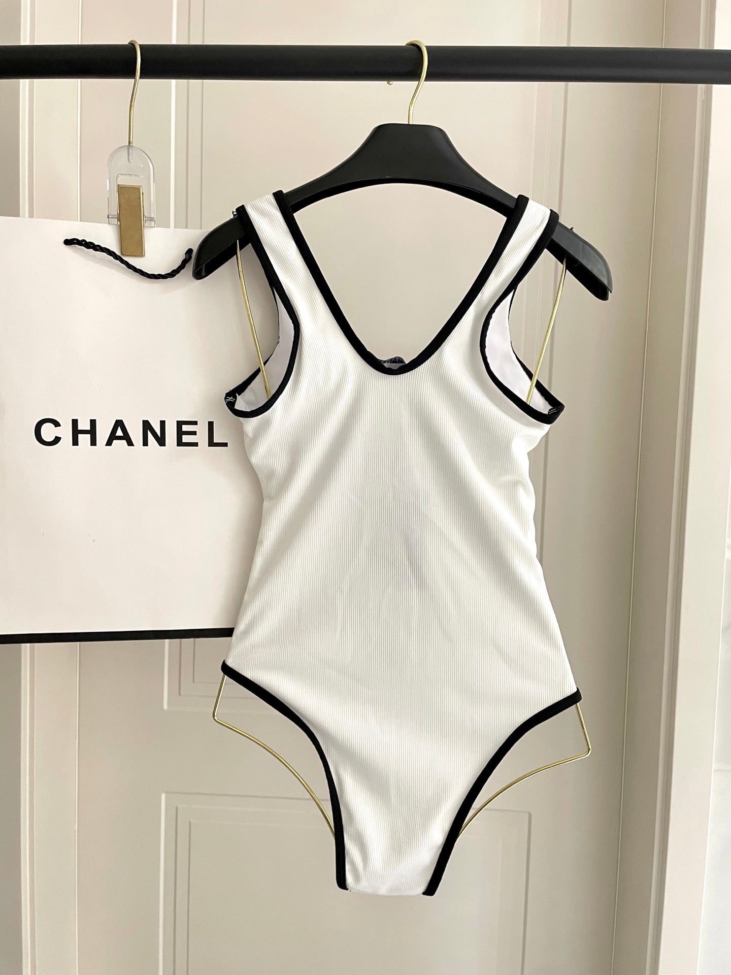 One-piece swimsuit with built-in bra pads.
