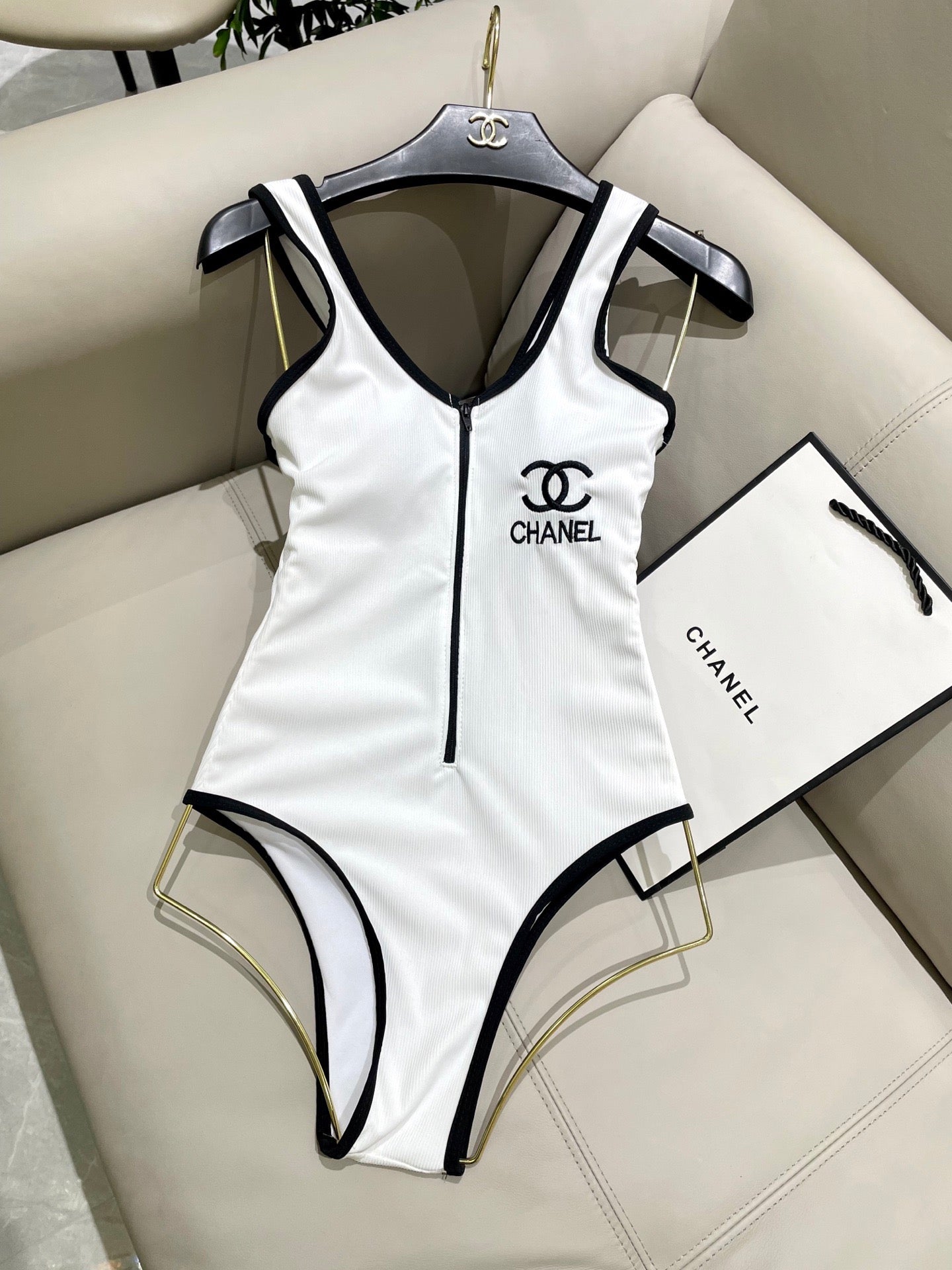 One-piece swimsuit with built-in bra pads.